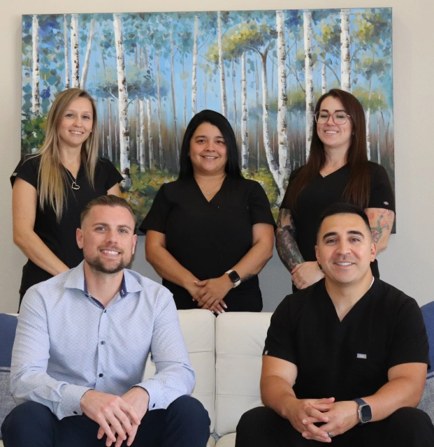 Dental team smiling together in the office