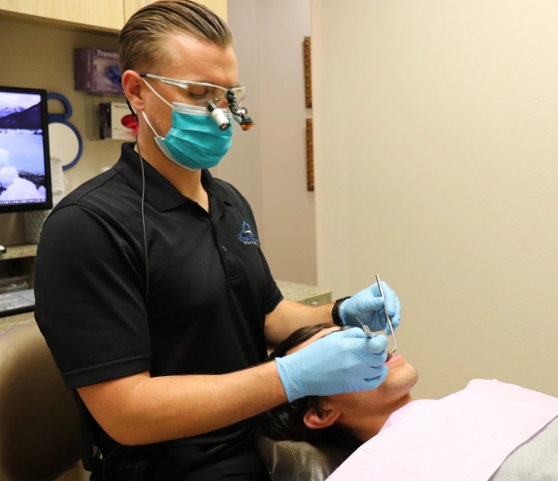 Dentist preparing to perform a tooth extraction